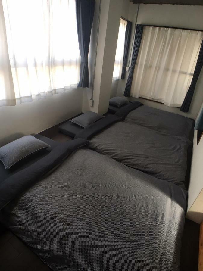 Guest House Golden Mile Hostel Амамі Екстер'єр фото