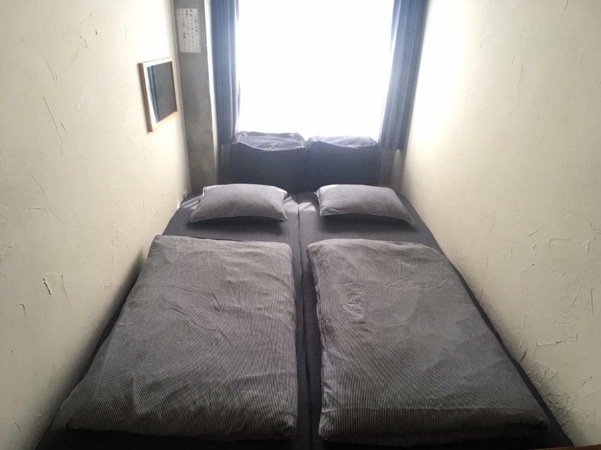 Guest House Golden Mile Hostel Амамі Номер фото